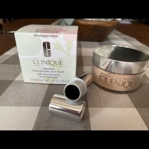 Clinique blended face powder and brush.